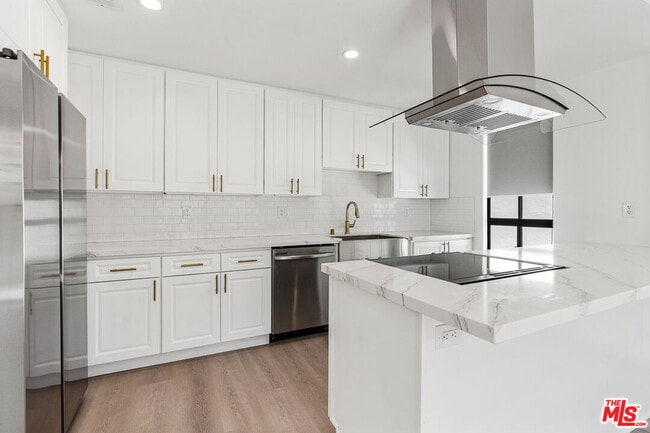 Building Photo - 9191 Charleville Blvd Unit 202