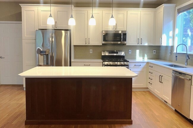 Photo - Beautiful Sherwood Home backs to Greenspace, Walking Distance to The Ridges! Entertainer's Backya...