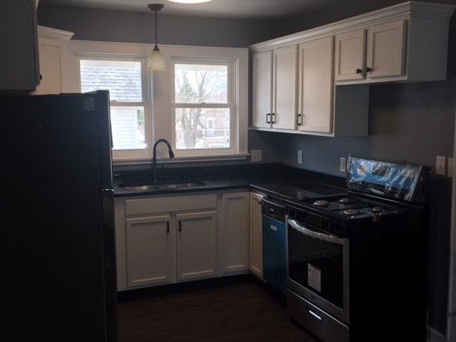 Updated kitchen with appliances - 2727 S Shore Dr Unit A
