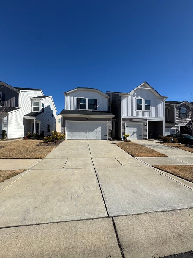 Photo - Beautiful 3BR 2.5 Townhouse w/ 2-Car Garage • EV Plug • Quartz Island • End Unit in Charlotte