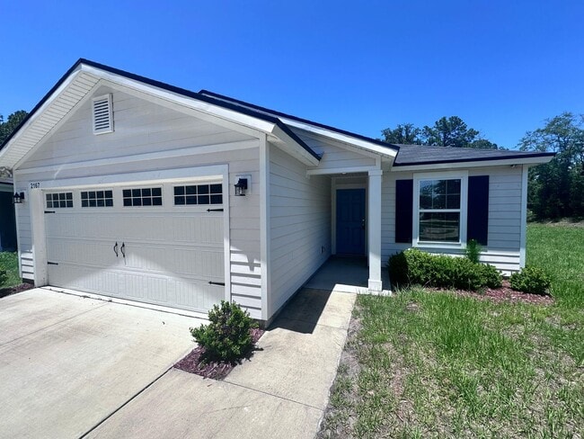 Photo - Gorgeous 4-Bedroom Home with Granite Counters & 2-Car Garage