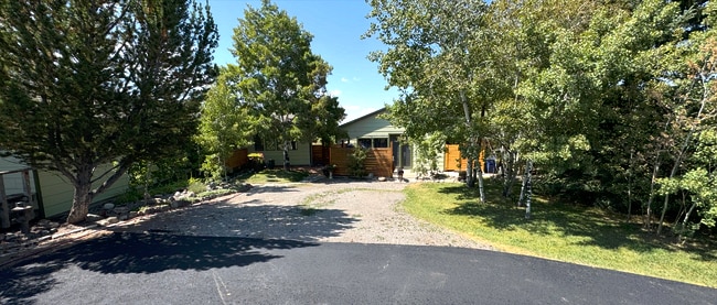Main house to the left. Little house, where we live, straight ahead. - 2541 Blackjack Pl