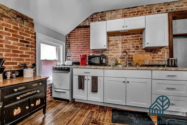 Building Photo - Furnished 1-Bedroom Upper Apartment on Prospect Ave Unit 3