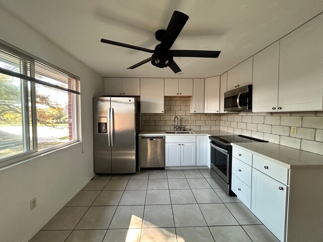 Photo - Spacious 2Br/1.5Ba End-Unit Townhome with Carport & Extra Storage