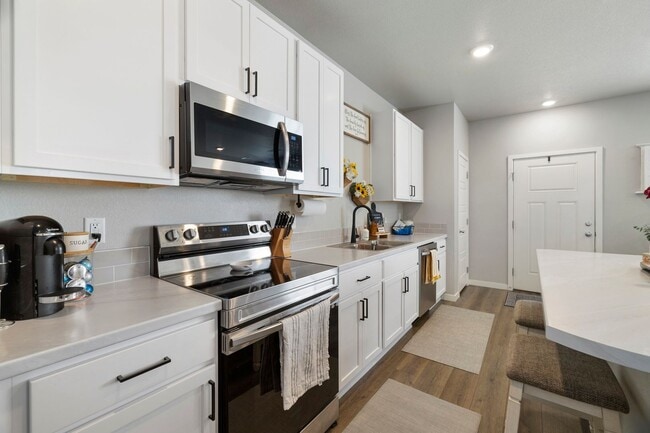 Photo - Beautiful 3-Bedroom Townhome with Park Views- Available July 25th!