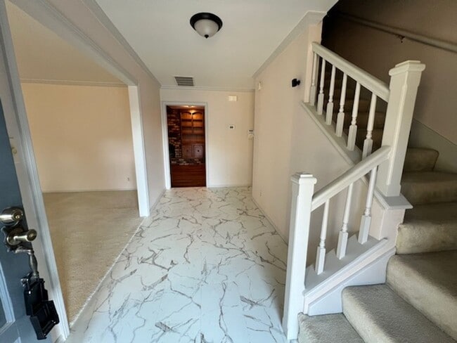 Photo - Step into this inviting, sunlit home where space and comfort blend seamlessly