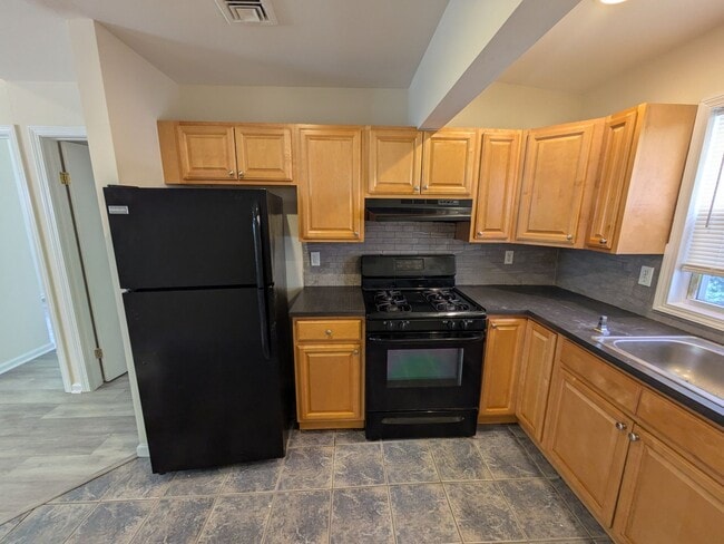 Building Photo - Bridge St Mixed-Use Unit Apt 49