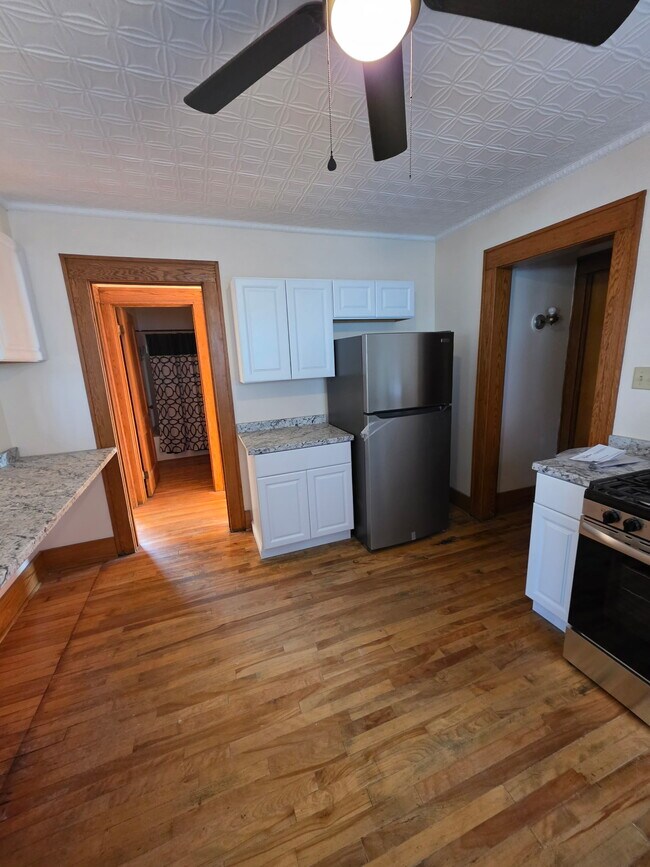 Brand new cabinets, stainless steel refrigerator, and stove - 144 Forest Hill Dr Unit 144