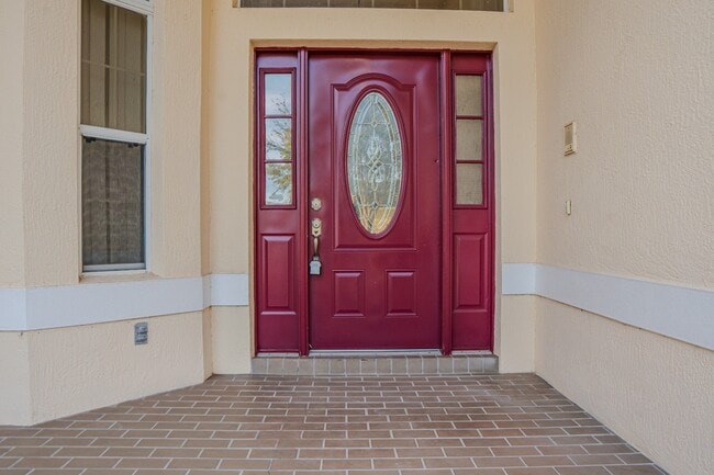 Photo - Spacious 5BR Home in Falcon Trace | 3-Car Garage | Screened Patio | Resort-Style Amenities Rent: ...