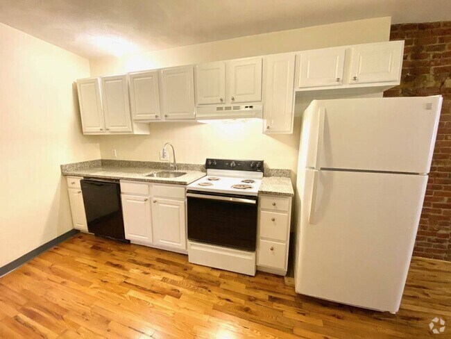 Building Photo - Steps From the T! Shiny Hardwood Floors-La... Rental