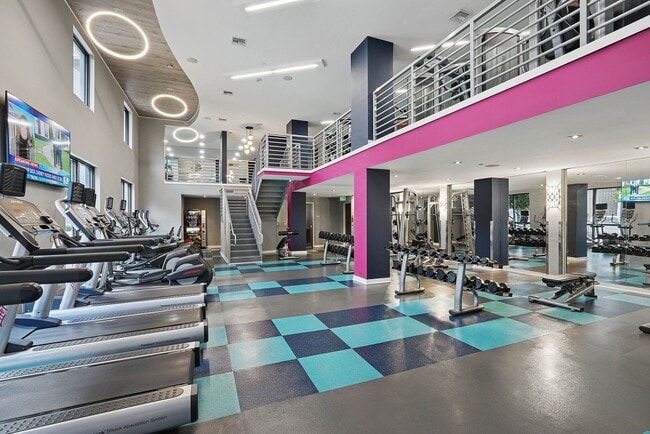24/7 fitness center with cardio and strength training equipment