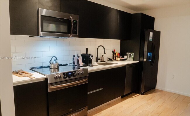 Photo - 398 NE 5th St Unidad 2615