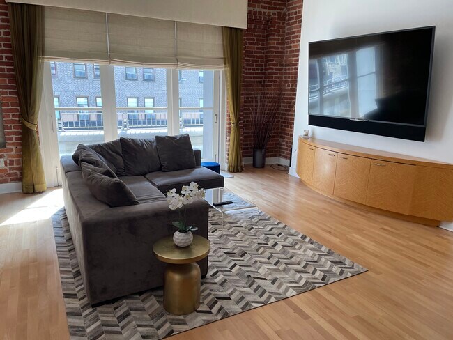 Great Room w TV - 333 Grant Ave Unit #301