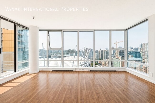 2 Bed + Den + Solarium | 2 Bath | Parking | Spectrum