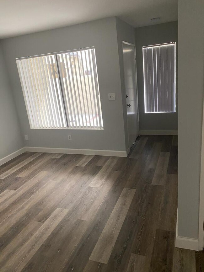 Sala de estar Alt. Vista - Claudina Apartments