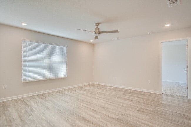 Photo - 4-Bed, 2-Bath Home in Woodlands Subdivision with Solar, Open-Concept Living, Modern Kitchen, Fenc...