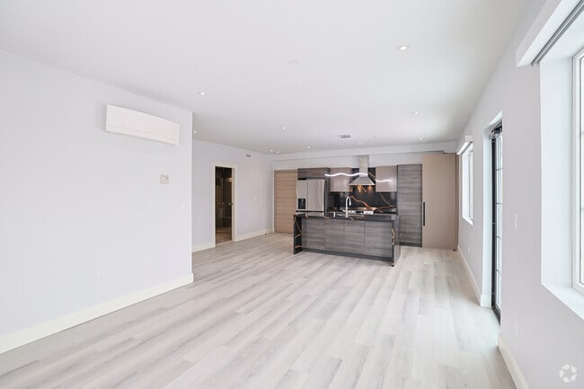 1BR, 1BA - 811SF - Living Room & Kitchen