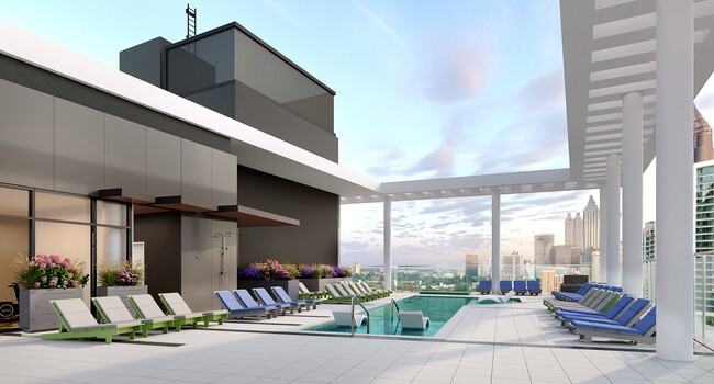 Rooftop pool with expansive sundeck, cabanas, and 360-degree skyline views. - Modera Parkside Apartments