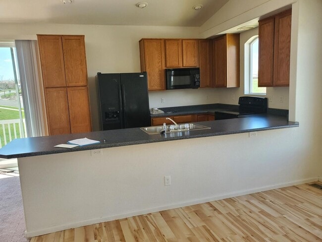 Photo - Tri-Level with Primary at top and 2 bedrooms on the lower level.