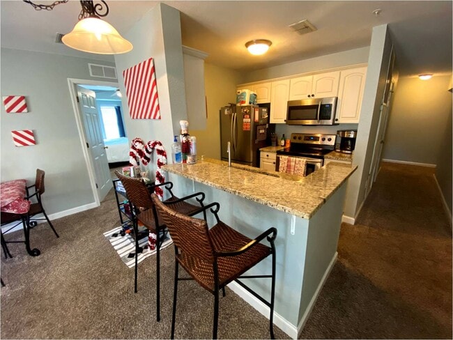Modern kitchen, granite counters, stainless steel appliances, dishwasher, everything! - 835 SW 9th St Unit 201