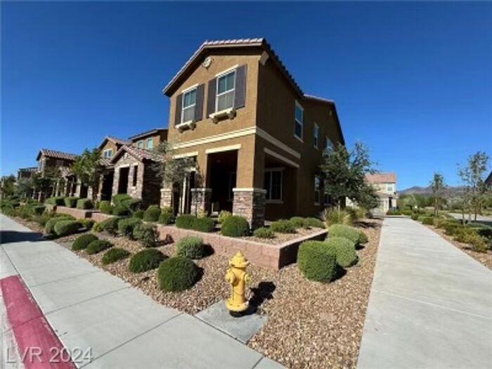 Photo - Modern 3-Bedroom Townhome with Open Living & Prime Henderson Location