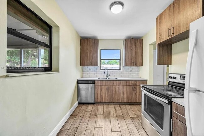 Photo - Spacious and well-maintained 3-bedroom, 2-bath single-family home on a corner lot in a convenient...