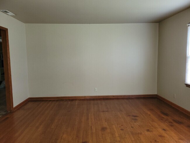 Photo - "Spacious 3-Bed Haven with Hardwood Floors in Huntsville – 2115 Sq Ft of Comfort!"