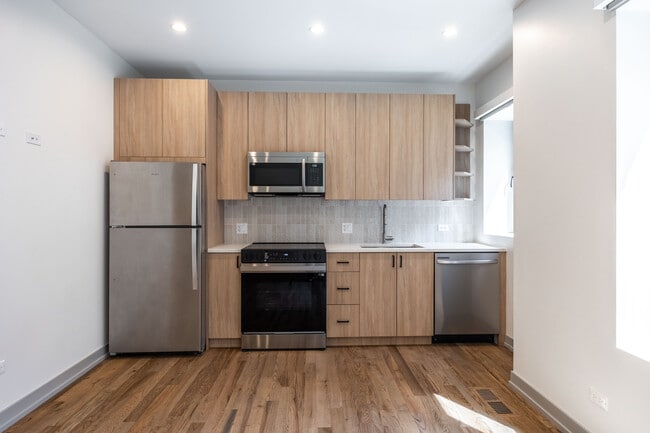 Building Photo - 1330 W Estes Ave Unit 1A