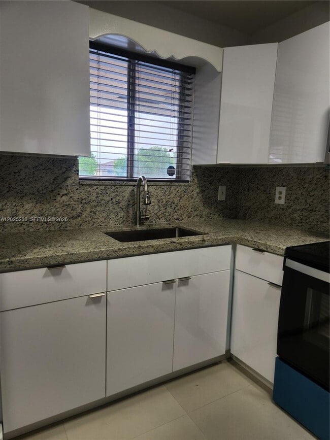 Photo - 7785 W 30th Ct Unit F-203