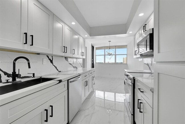 Photo - 100 Golden Isles Dr Unidad 1410