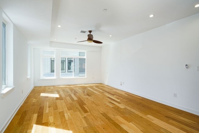 Photo - Stunning 4-Bedroom Townhouse with Garage and Rooftop Deck! Available late May!