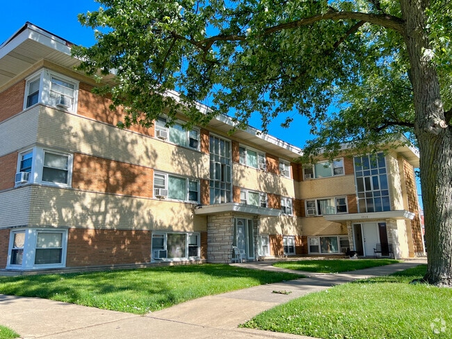 Building Photo - 7717 W Fullerton Ave Unit BR Rental