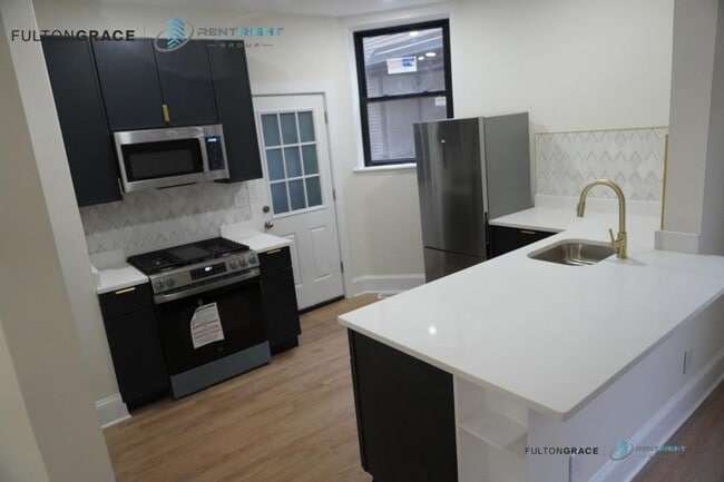 Building Photo - 4 bedroom in Chicago IL 60625 Unit 1