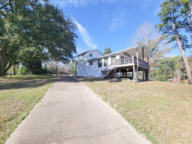 Building Photo - Escape to your updated 3-bed, 2-bath oasis in Goodrich, TX, featuring modern finishes, an open la...