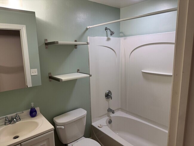 Updated bathroom with built in shelves - 1369 Saint Clair Ave Unit Upper