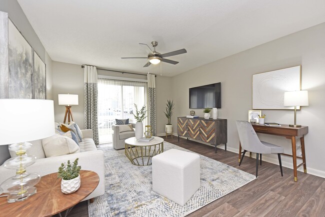 Living Room with Hardwood-Style Flooring - Watermark Apartments