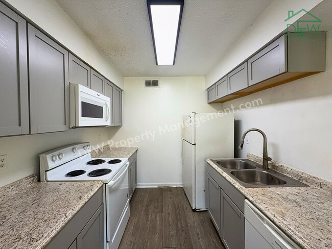 Photo - Inviting 3-Bedroom Condo with Fenced Backyard and Pool Access for LEASE in Irving, TX