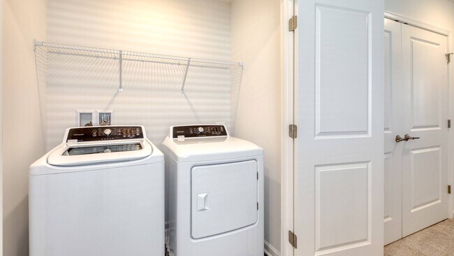 Full-size washer and dryer included