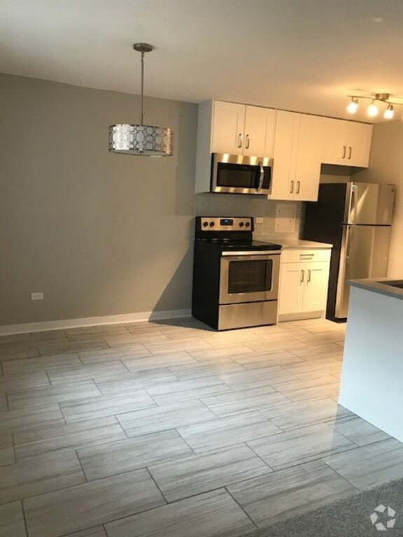 Building Photo - 2349 W Jarvis Ave Unit 2B Rental