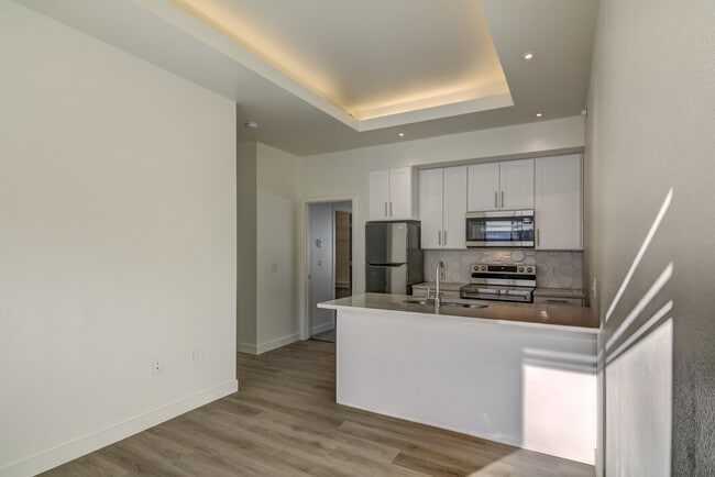 One bedroom, some with tray ceiling