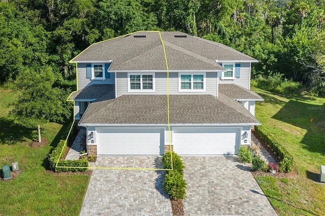 Building Photo - "Spacious 3-Bedroom Townhouse Retreat in New Port Richey – 5382 Riverwalk Preserve Drive!"
