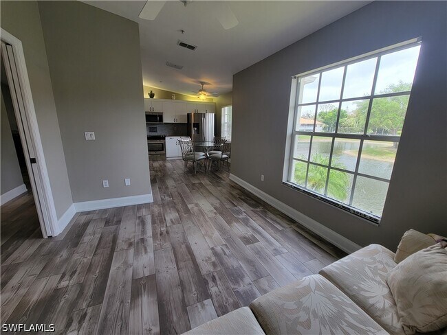 Building Photo - 7577 Silver Trumpet Ln Unit T-204