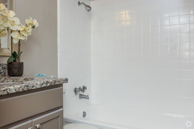 2BR, 1.5BA - 888SF - Primary Bathroom - Riverbend Apartments