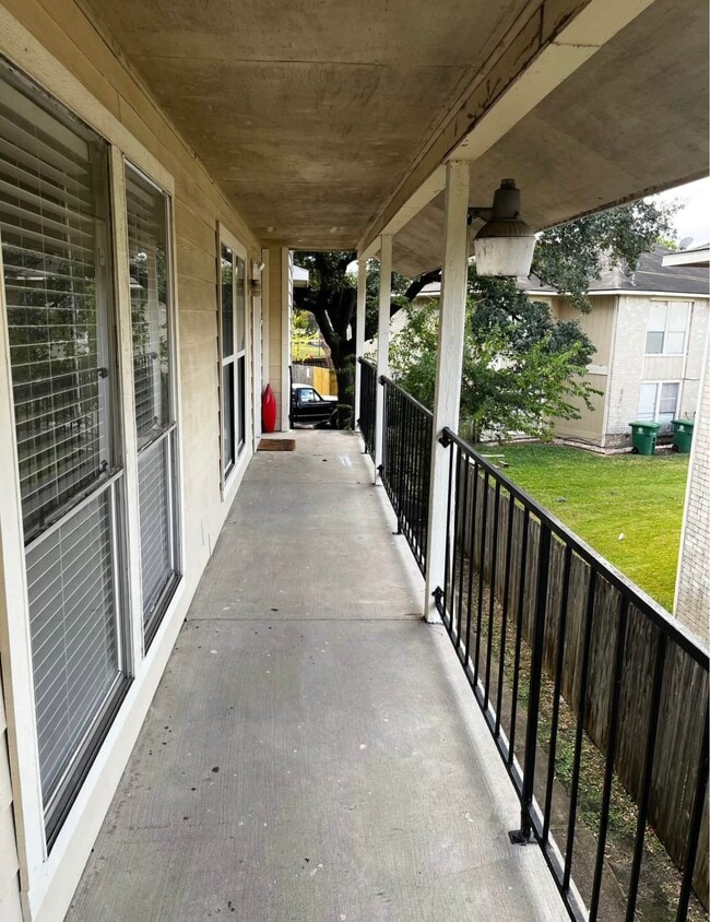 Building Photo - 12118 W Bellfort Ave Unit C