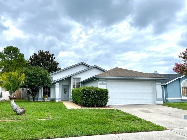 Building Photo - 3/2 ALAFAYA WOODS ADORABLE HOME in OVIEDO!