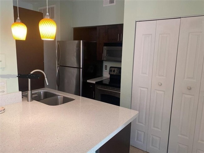 Building Photo - 18330 NW 68th Ave Unit XXX