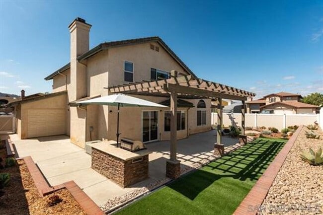 Photo - Beautifully Remodeled Home with outdoor Kitchen and Spa!