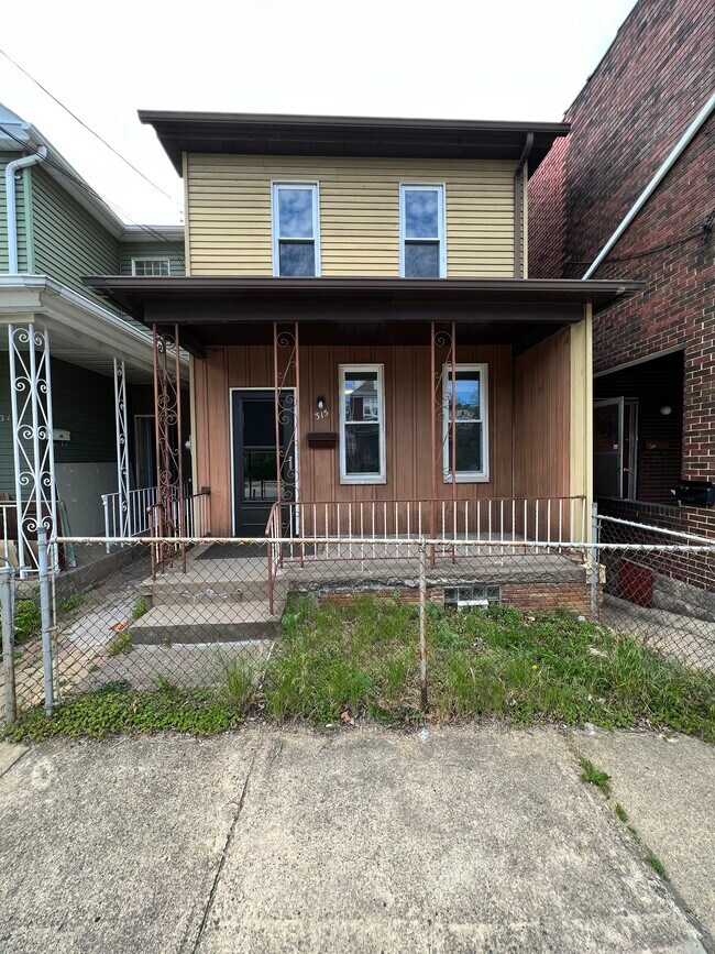 Frente - 315 E 18th Ave