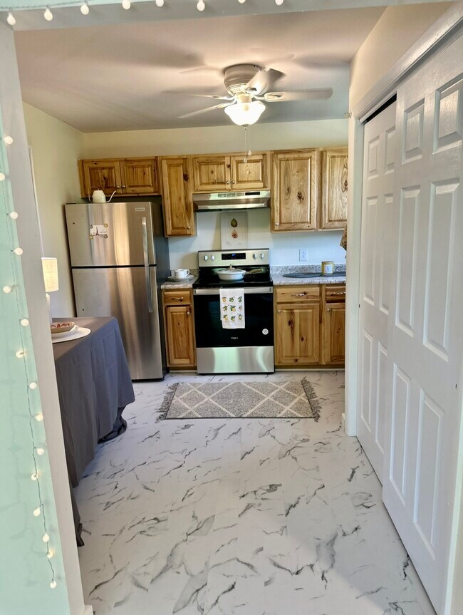 Kitchen entrance from living room - 91 Faith St Unit 91