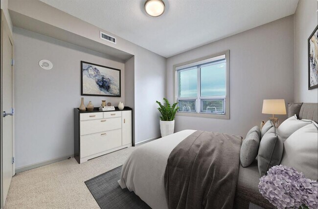 Photo - 210-615 15 Ave SE